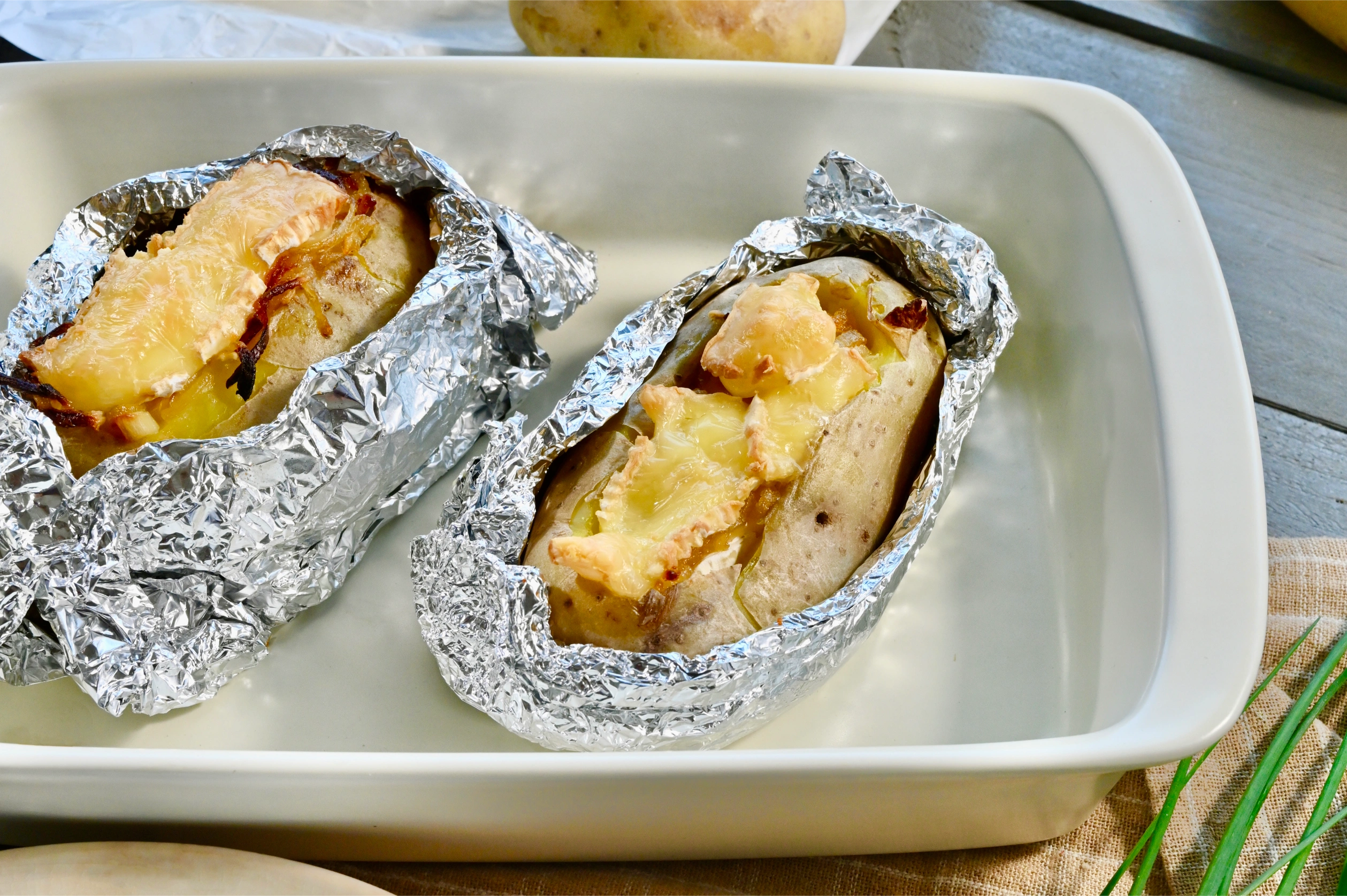 Photo Pomme de terre au camembert en papillotes