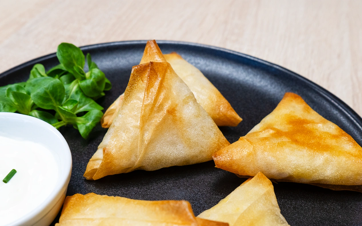 Photo Samoussas aux pommes de terre, saumon fumé et mozzarella